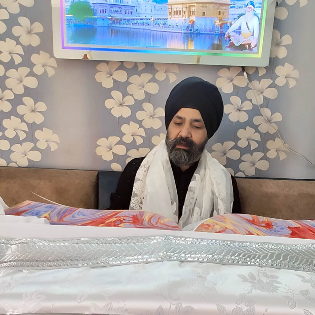 Vinay Singh Mediratta with Shri Guru Granth Sahib Ji